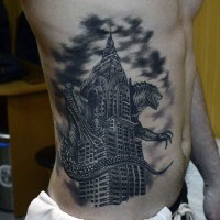 Großer schwarzer und weißer sehr detaillierter böser Godzilla auf Empire State Building Tattoo