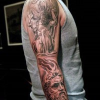 Big black and white very realistic looking antic statue tattoo on sleeve