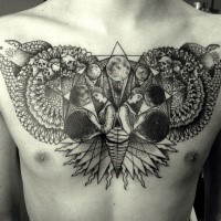 Big black ink chest tattoo of mysterious picture with skulls