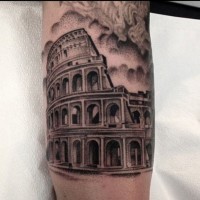 Big black ink detailed forearm tattoo of ancient Roman arena