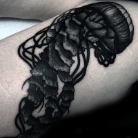 Big black ink detailed jellyfish tattoo on arm