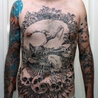 Big black ink detailed tattoo on whole chest and belly with sleeping fox with flowers and skull