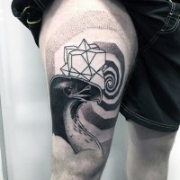 Big black ink hypnotic picture tattoo on thigh combined with eagle head and geometrical figure