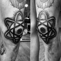 Big black ink knee tattoo of amazing looking symbol