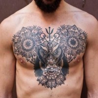 Big black ink mystical tattoo with flowers and owl stylized with symbols tattoo on chest