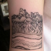 Big black ink simple landscape tattoo on wrist