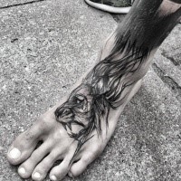 Big black ink sketch painted by Inez Janiak tattoo of roaring lion on foot