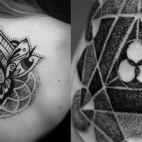 Tatuaje en la espalda, flor extraordinaria con mariposa