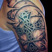 Big Celtic style cross with medieval armor tattoo