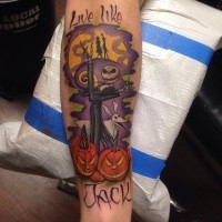 Big colored forearm tattoo of monster cartoon heroes with lettering