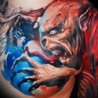 Big colored horror style detailed evil devil tattoo on chest and shoulder