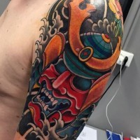 Big colored mystical samurai helmet tattoo on shoulder