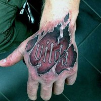 Big colored ripped skin tattoo with lettering on arm