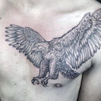 Big detailed black and white flying eagle tattoo on chest