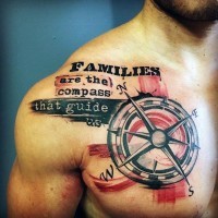 Big detailed compass with sentimental wise lettering tattoo on chest and shoulder