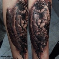Big detailed looking arm tattoo of angel statues