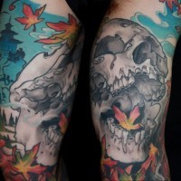 Big fantasy human skull tattoo on half sleeve with leaves and Asian house
