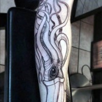 Big fantasy like black ink squid tattoo on arm