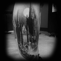 Big fantasy like old castle black and white tattoo on leg