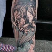 Big half colored fantasy horse with fish tail tattoo on leg