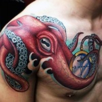 Big multicolored detailed octopus with compass tattoo on chest