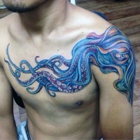 Big multicolored evil squid tattoo on shoulder and chest