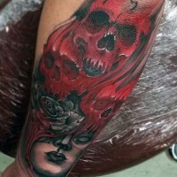 Big multicolored mystical witch with skulls tattoo on arm