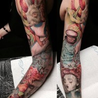 Big multicolored sleeve tattoo of various cartoon heroes