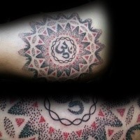 Big stippling style colored arm tattoo of large flower with symbol
