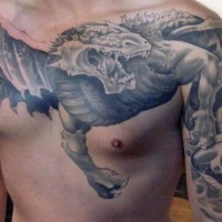 Big terrifying dragon tattoo on chest and half sleeve