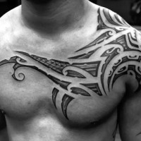 Big tribal style simple ornaments tattoo on chest