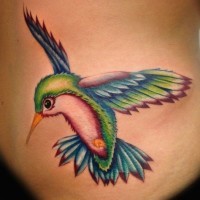 Nice coloured hummingbird tattoo