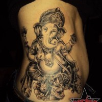 Black and gray ganesha tattoo on ribs