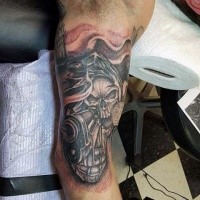 Black and gray style arm tattoo of mystical skeleton warrior with pistol