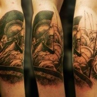 Black and gray style detailed arm tattoo of Spartan warriors