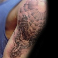 Black and gray style detailed shoulder tattoo of Icarus with sun