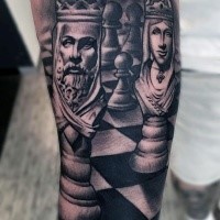 Black and gray style detailed shoulder tattoo of chess figures