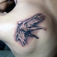 Black and gray style detailed small scapular tattoo of flying Icarus