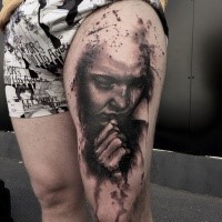Black and gray style detailed thigh tattoo of praying woman