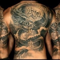 Black and gray style detailed whole back tattoo of ancient Asian statue