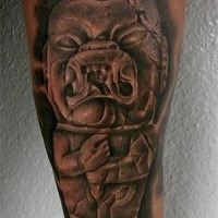 Black and gray style forearm tattoo of antic stone statue