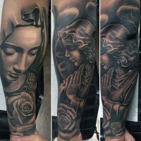 Black and gray style interesting looking tattoo of praying woman with roses