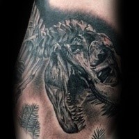 Black and gray style large dinosaur skeleton tattoo