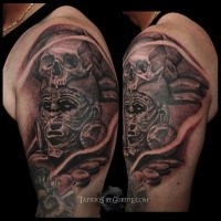 Black and gray style shoulder tattoo of ancient tribe warrior with skull