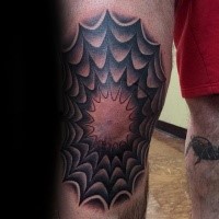 Black and gray style spider web like big ornament tattoo on knee