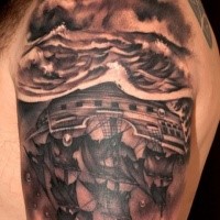Black and gray style underwater sailing ship tattoo on shoulder