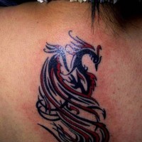 Black and red tribal phoenix tattoo on back