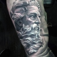 Black and white detailed antic statue tattoo on arm