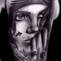 Black and white detailed shoulder tattoo of cute gird and snowboarder