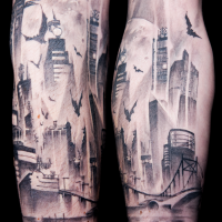 Black and white forearm tattoo of abandoned city with bats